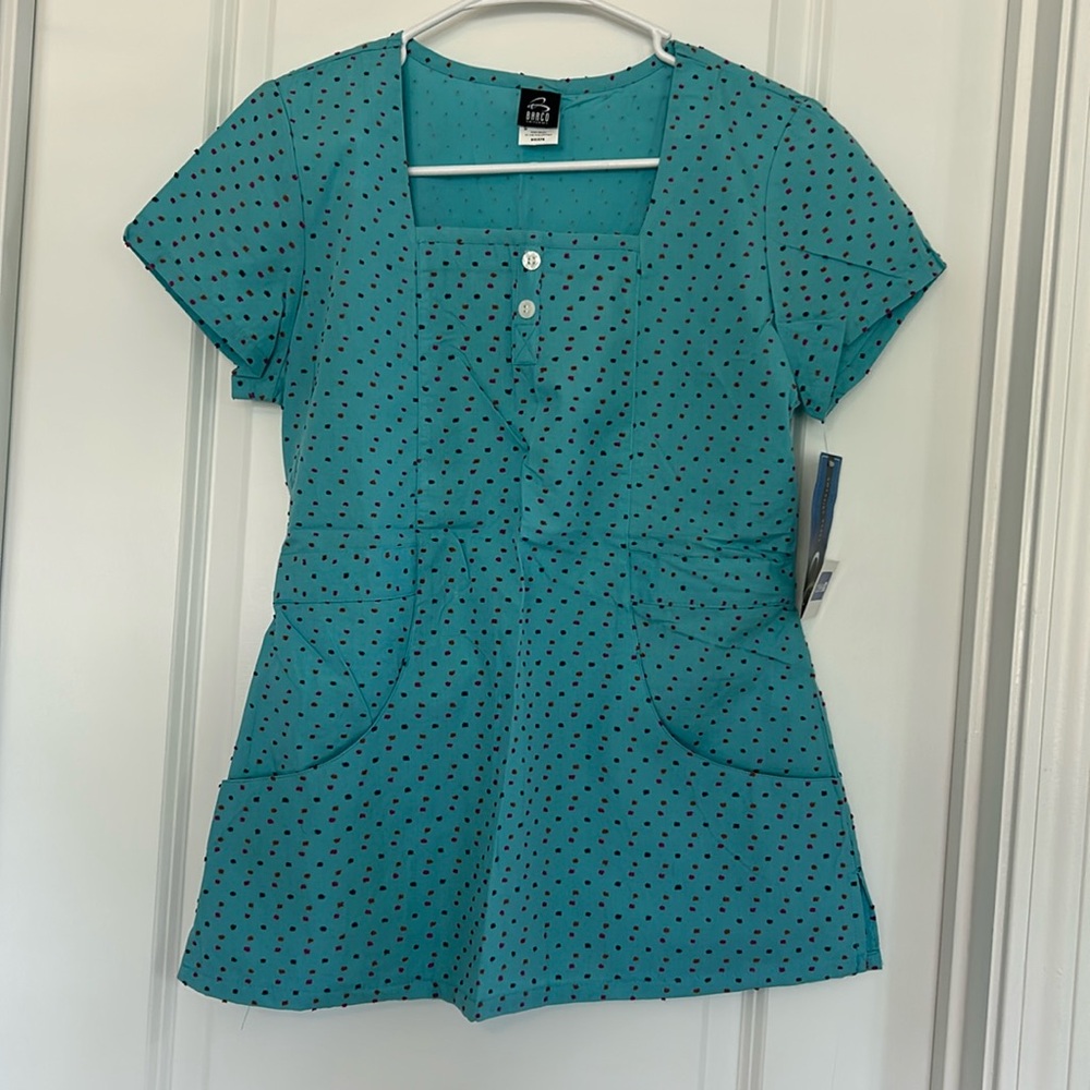 NWT. Women’s. Size S. Barco Uniforms Blue Short Sleeve Fitted scrub top.